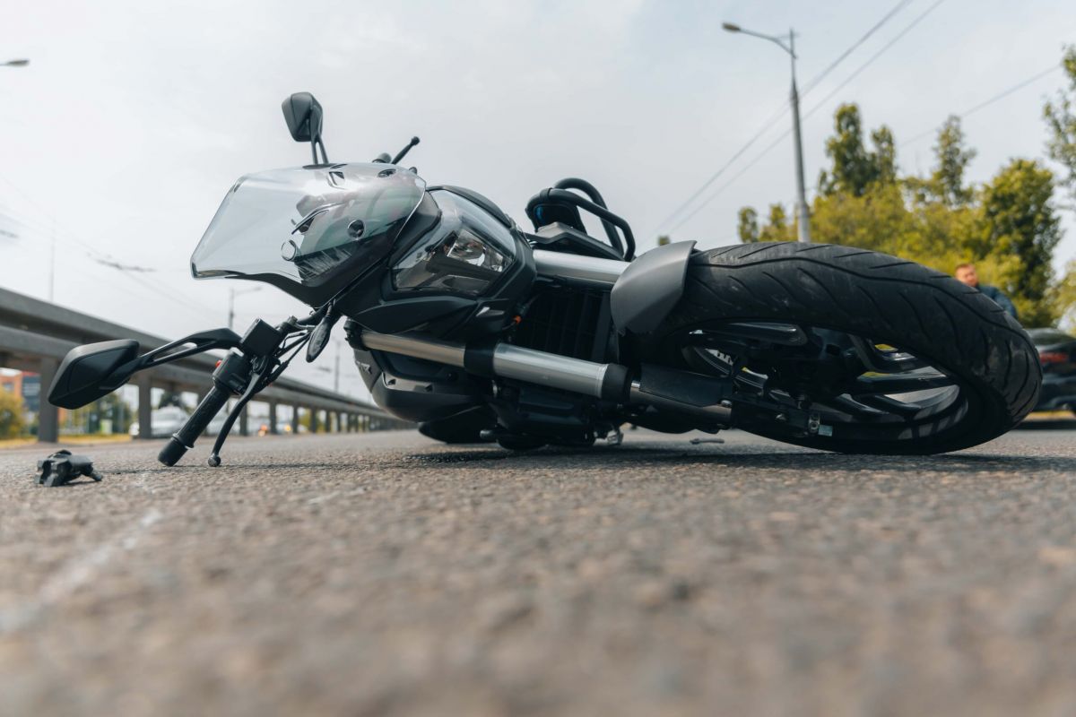 motorcycle lying on its side after crash