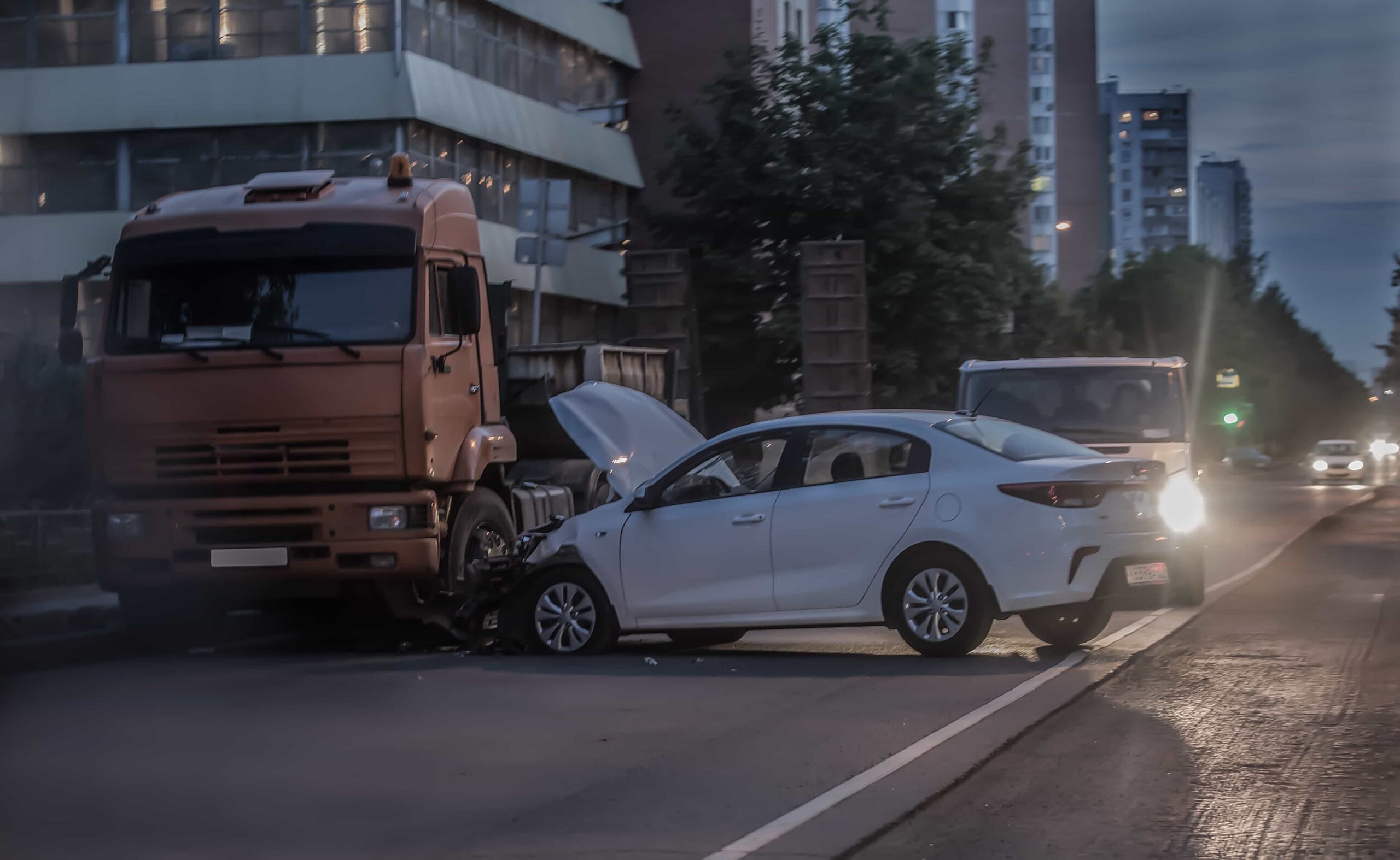 car crashed into side of truck