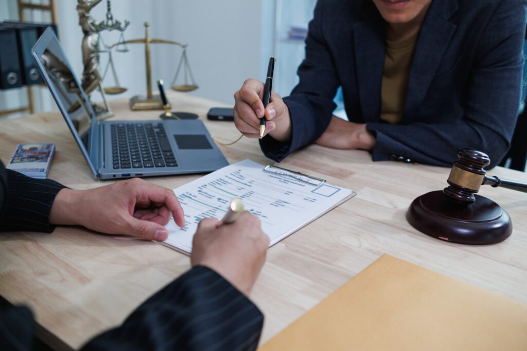 Lawyer and client reviewing document